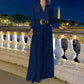 Elegant long-sleeved blouse with V-neckline and wide sequinned jumpsuit trousers