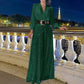 Elegant long-sleeved blouse with V-neckline and wide sequinned jumpsuit trousers