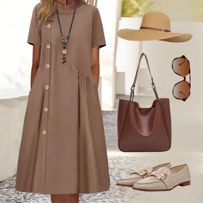 Women's dress with short sleeves and a decorative button
