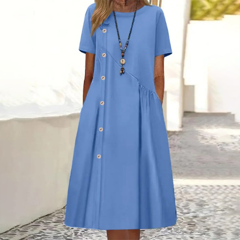 Women's dress with short sleeves and a decorative button