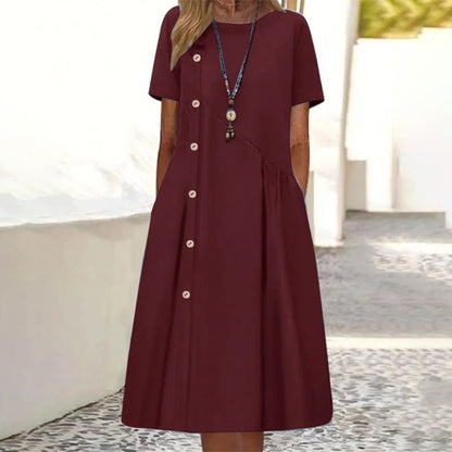 Women's dress with short sleeves and a decorative button
