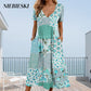 Women's V-neck dresses with short sleeves in patterned designs