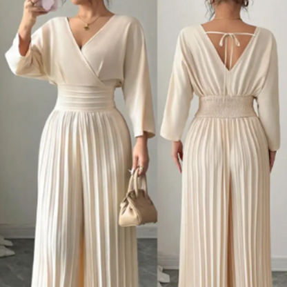🥳2026 HOT SALE🥳💞50K+ SOLD!🌸👖 50% OFF! Women’s V-Neck Wide-Leg Jumpsuit – Smocked waist creates hourglass shape. Flowing 3/4 sleeves, graceful movement. A stunning piece for special occasions. 🛡️✅